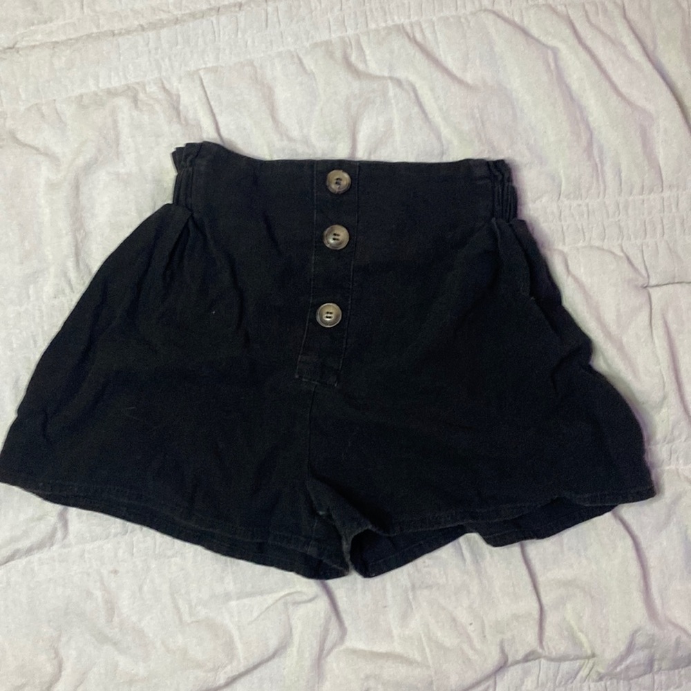 Black shorts with buttons